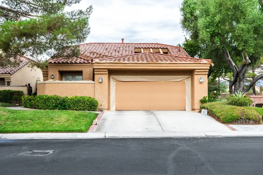 Las Vegas home exterior masked and prepped for repaint